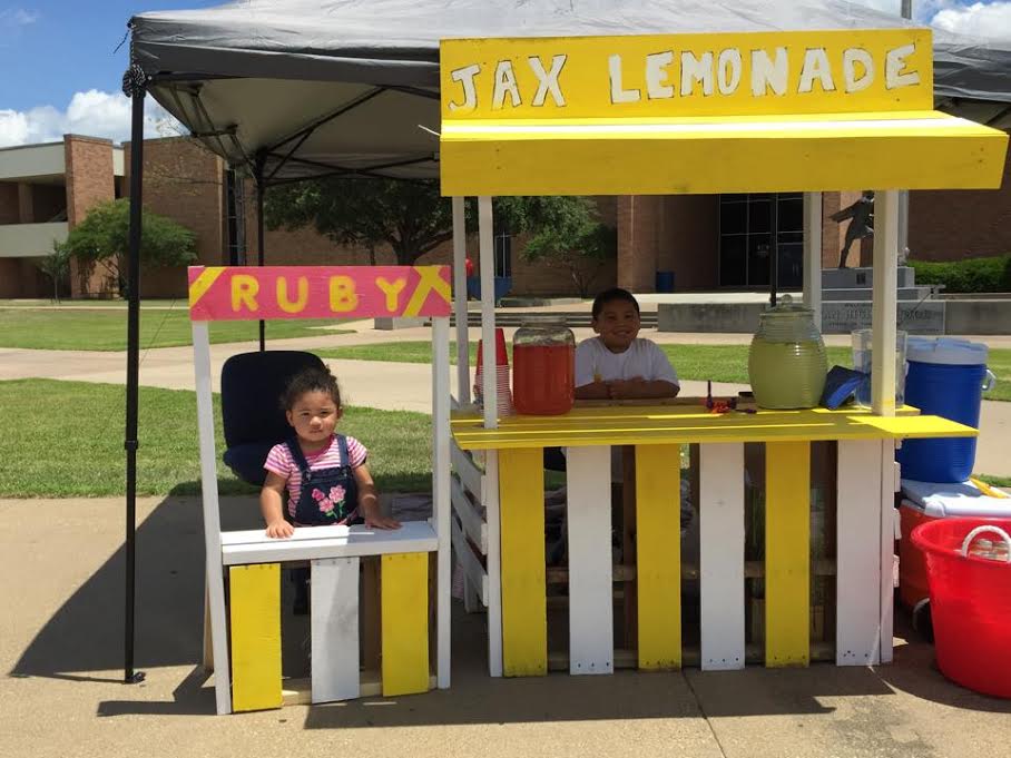 Two College Station business owners sell their goods as part of Lemonade Day!
